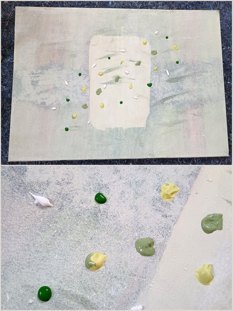 Farbe auf Leinwand für das Motiv verteilen